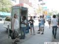 Cell phones and cordless home phones are useless, so callers wait on line to use pay phones. (8/15/03)