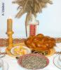 Christmas Eve dinner (Sviata Vechera): Prosfora (bread dipped in honey), Mushroom gravy, Kolach (braided 'babka'), Compote (made with dried fruit), Kutia (wheat berries, honey, poppy seeds), Didukh (grain bouquet), Beeswax candle