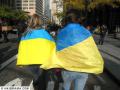Ukrainian flags keep them warm on a brisk Autumn day. Holodomor March, NYC, 11/17/07. Photo: H.Krill
